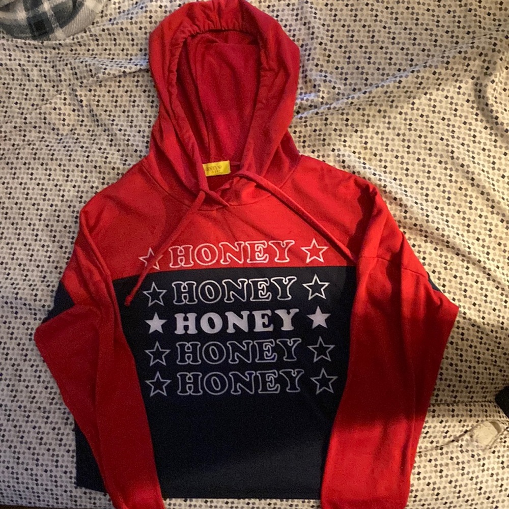 A crop top it’s red blue and white the brand is queen bees and it’s super cute